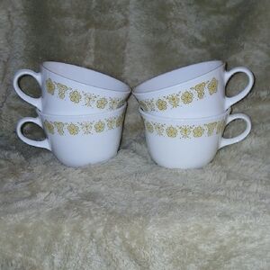Floral White and Yellow Tea Cups